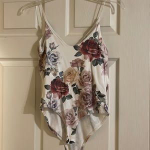 Floral body suit. Wonderful for spring and summer. Can be worn under a cardigan